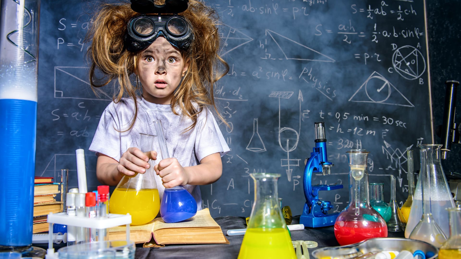A little girl makes a mess in a science lab with an experiment gone wrong.