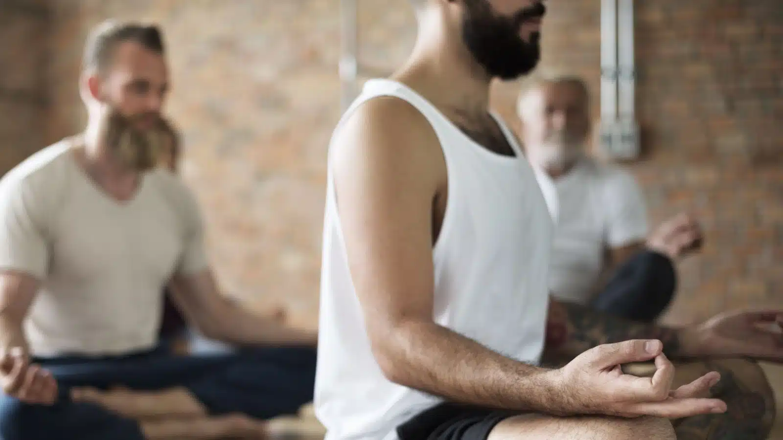 men doing yoga, a feminine-coded work out.