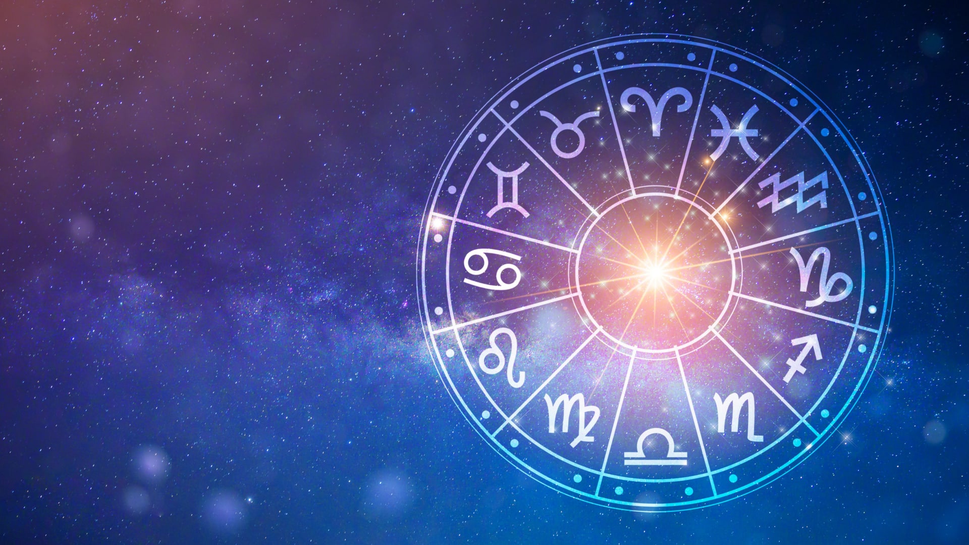The Zodiac wheel on a blue etheral background.