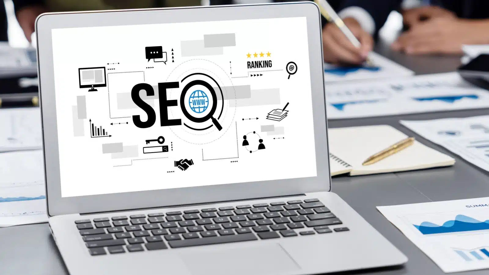 A laptop showing SEO icons.
