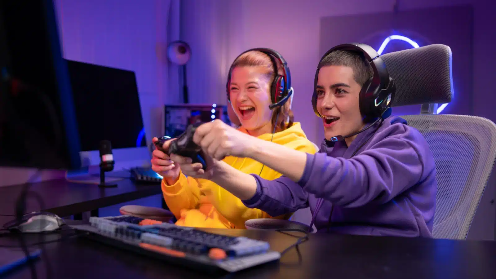 Female friends streaming video games together.