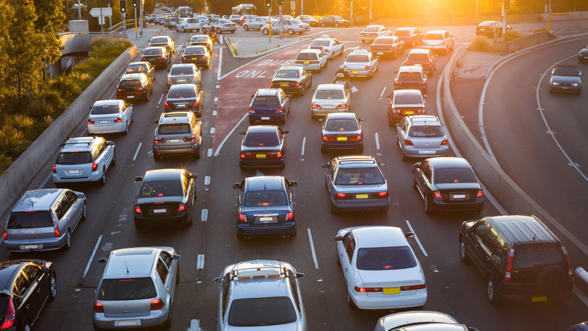 A highway intersection with lines of traffic.