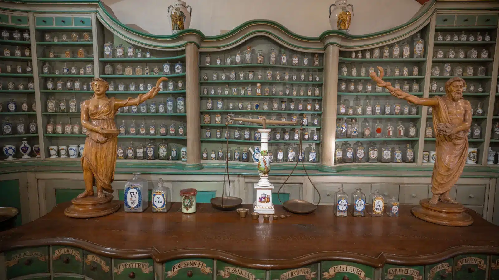 A table and collection of bottles inside the German Apothecary Museum at Heidelberg Castle.