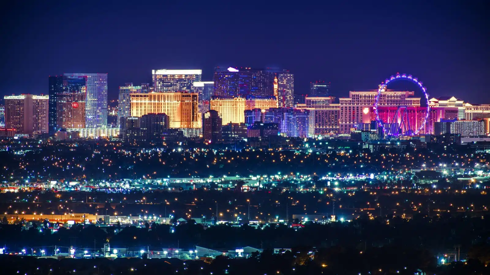 Las Vegas skyline at night, from a distance.