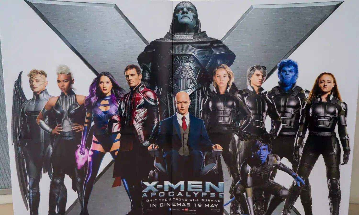 A movie poster from X-Men Apocalypse featuring Professor X front and center.