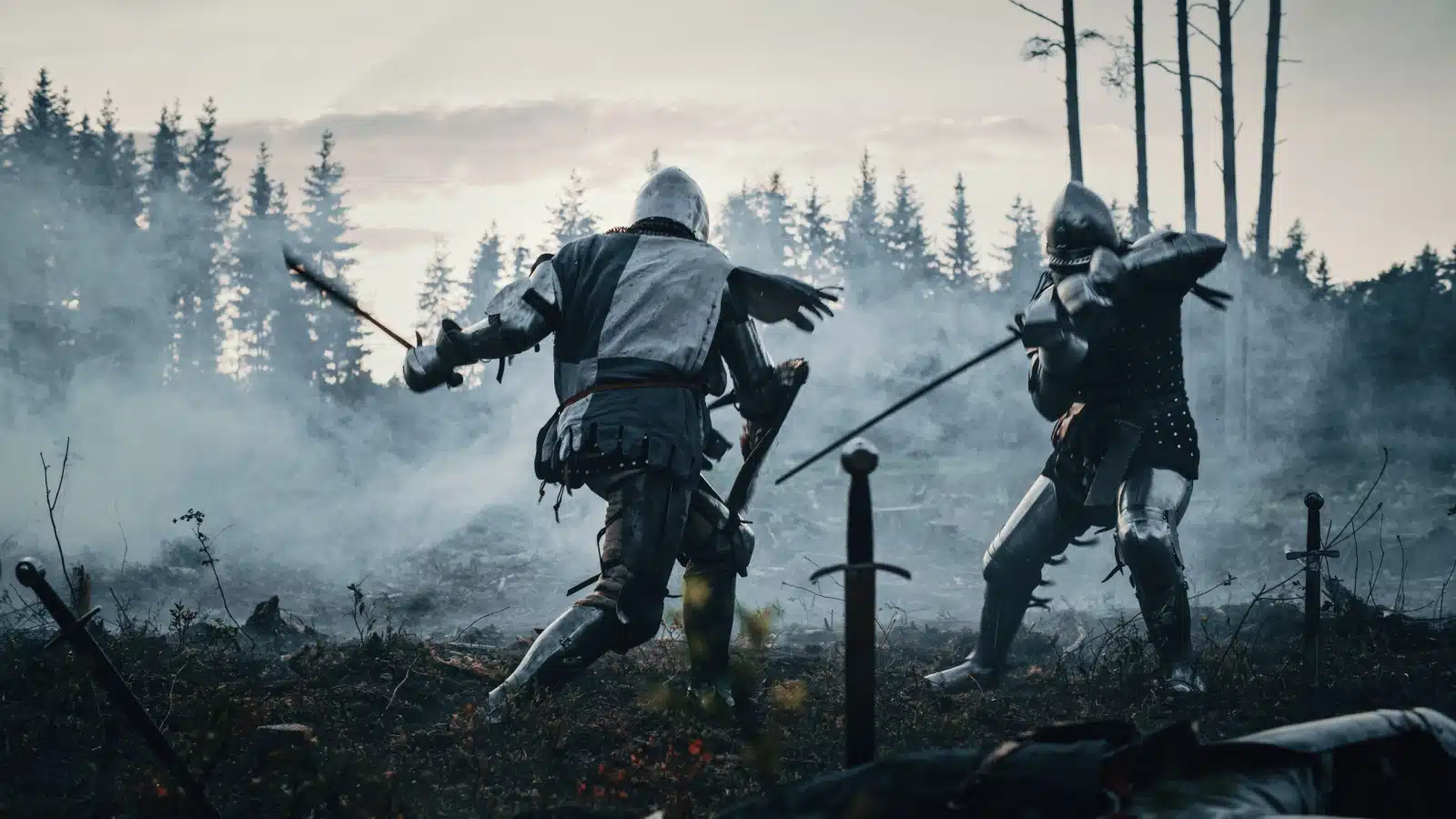 The white knight fighting the black knight to represent famous enemies in stories.