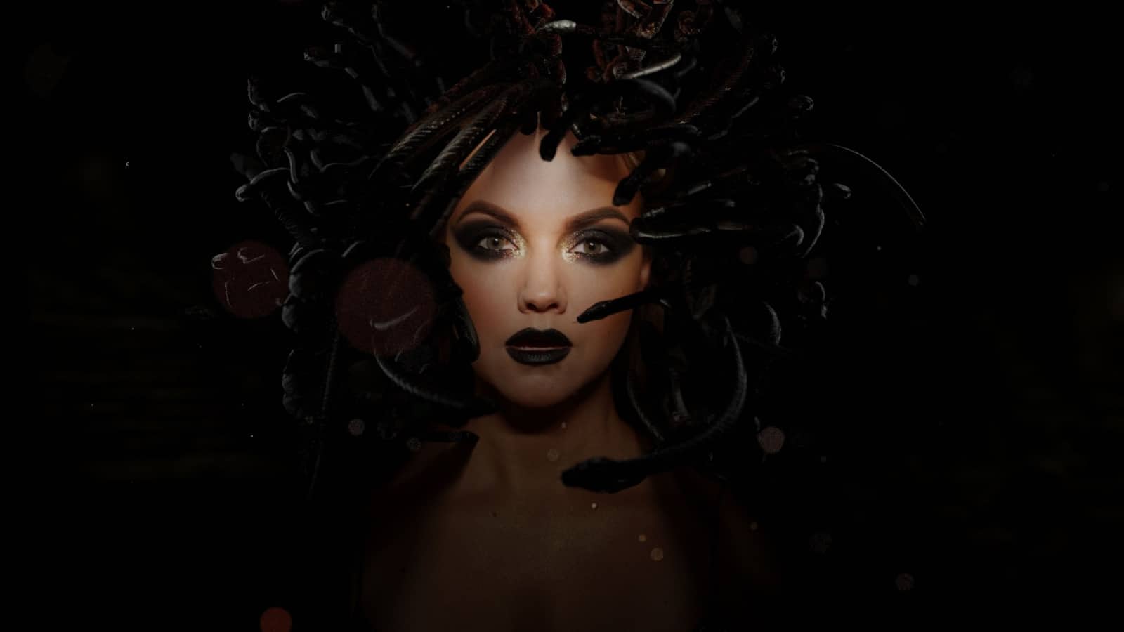 A woman dressed as the Gorgon Medusa, to represent antagonists who weren't actually villains.