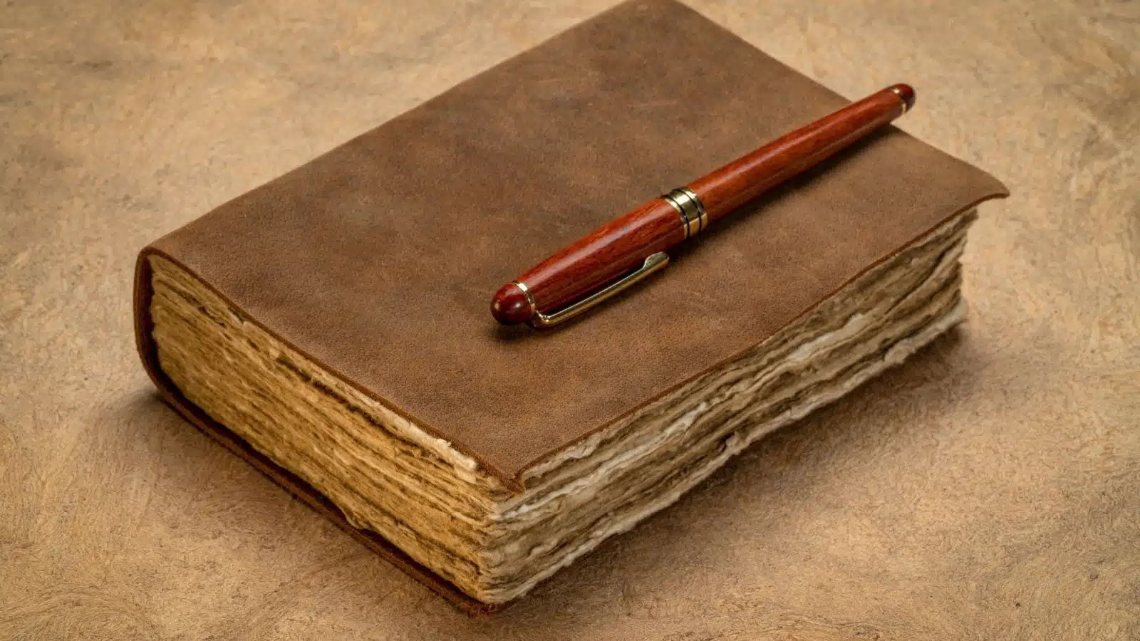 A vintage looking leatherbound journal.