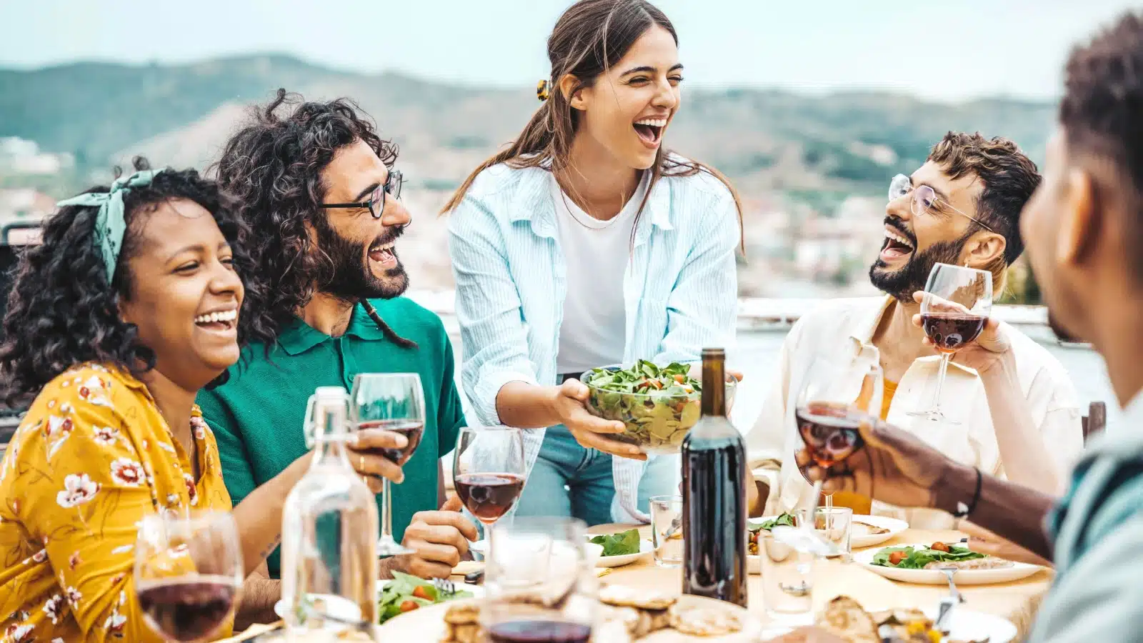 Friends enjoying an outdoor brunch in the springtime.