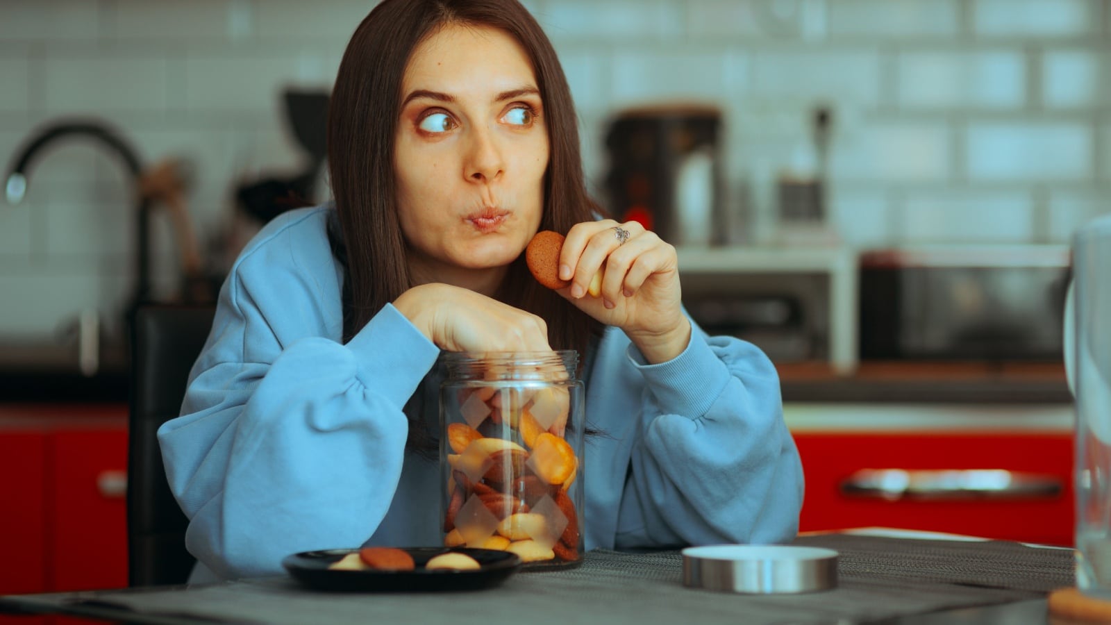 A woman is caught with her hand in the cookie jar as she tries to break bad habits but lacks self control.