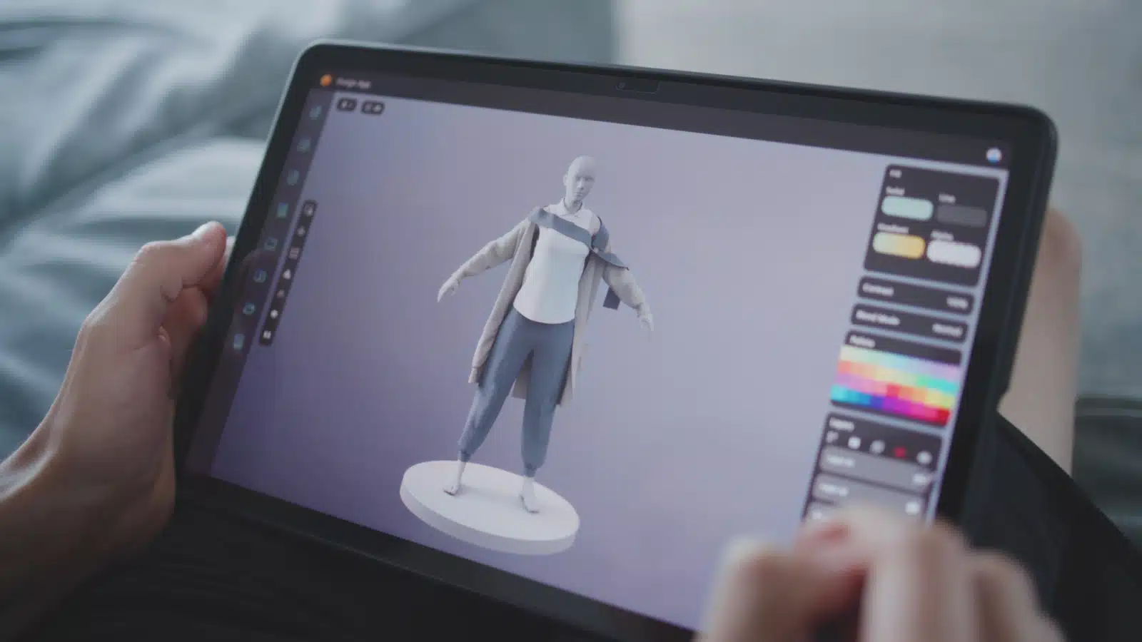 Using a drawing tablet to create a digital character, which represents character development.