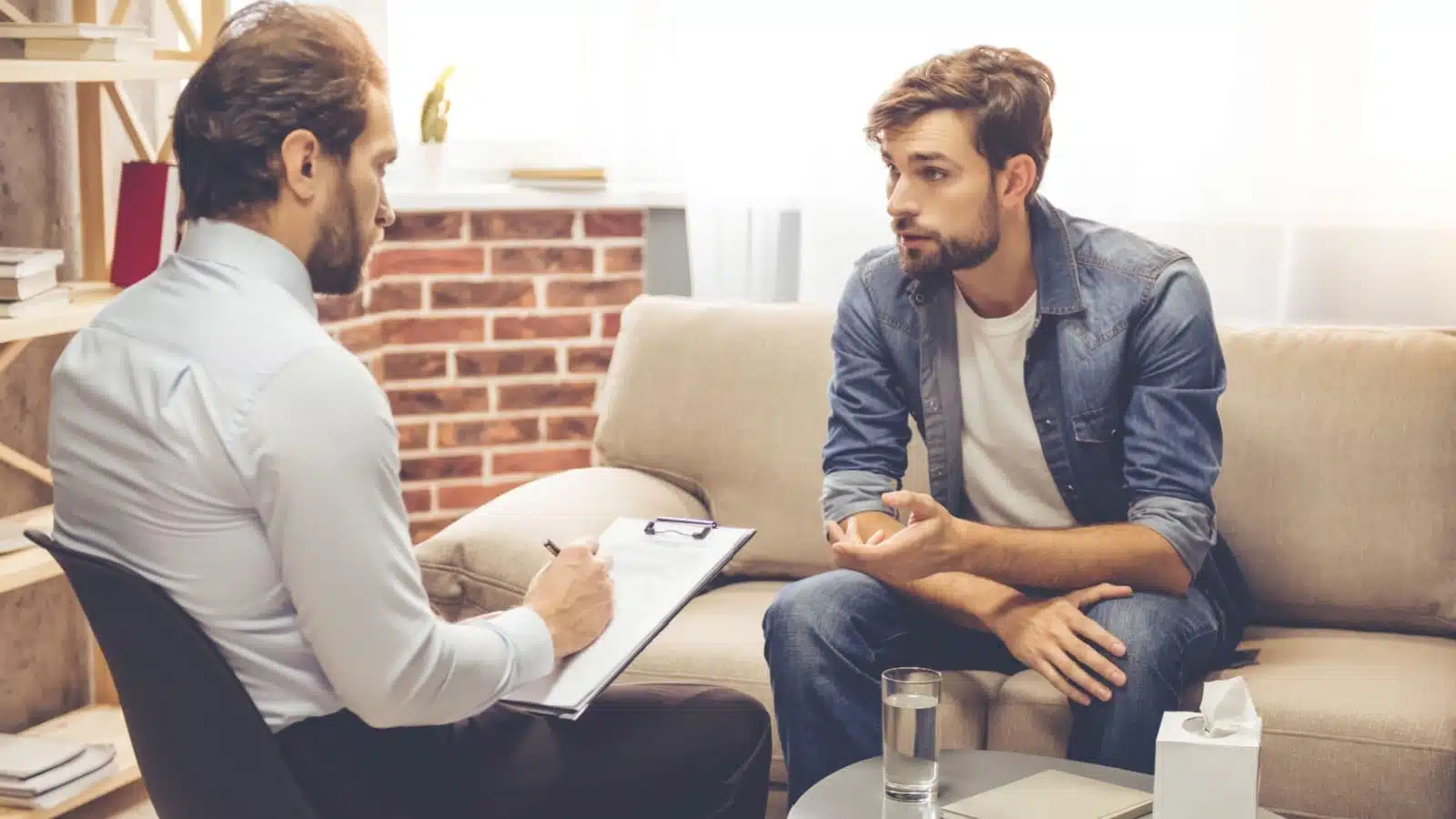 A man talks to a therapist.