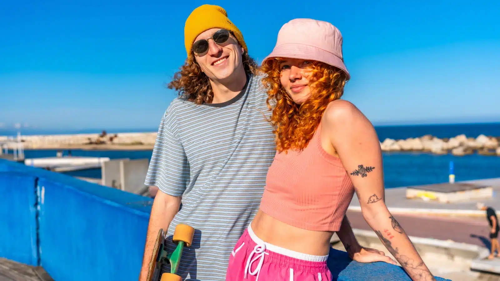 A happy carefree couple enjoying life at the beach. Their living life on their own terms.