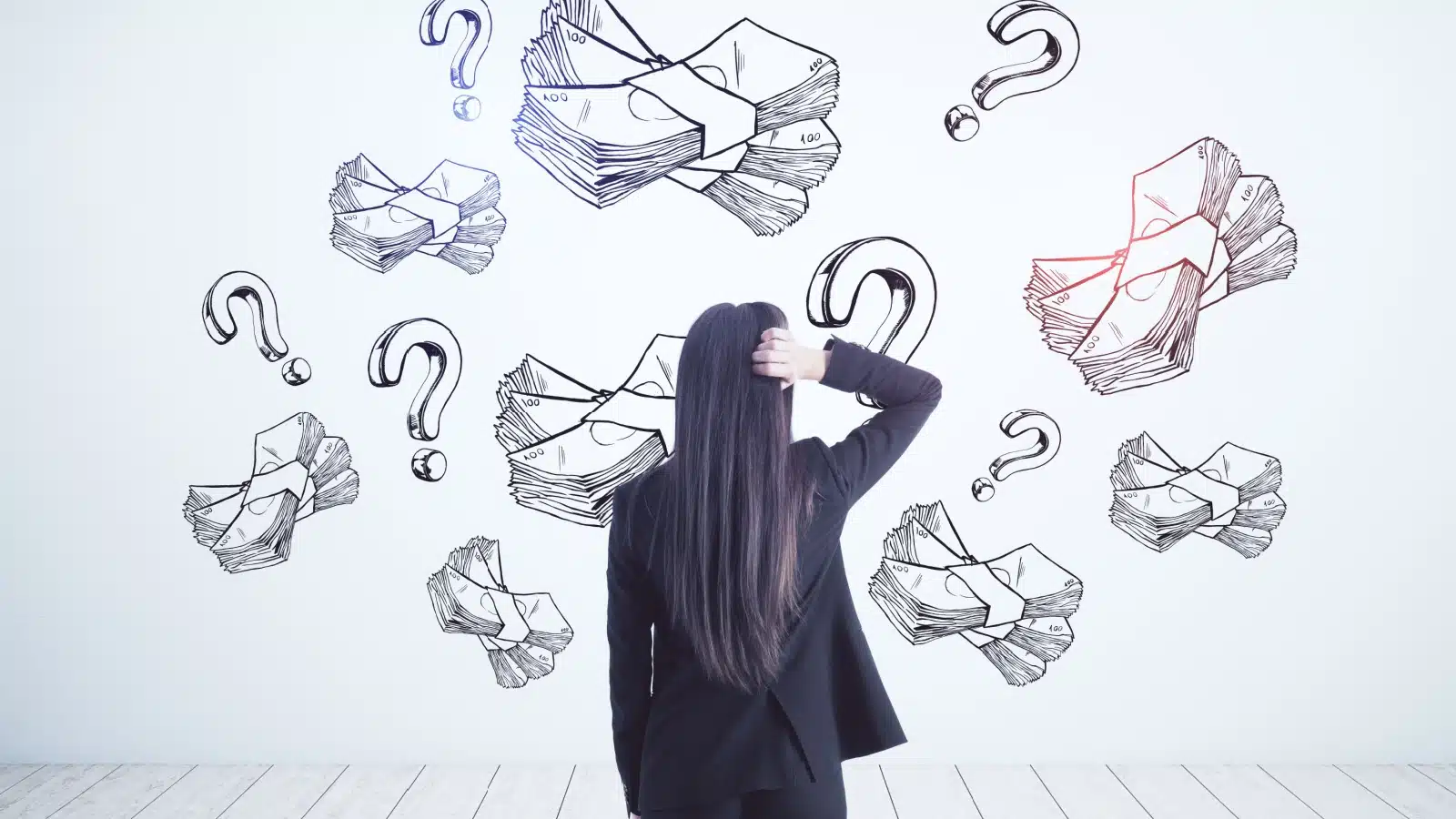 A woman scratches her head while looking at sketches of bundled dollars and question marks on the wall in front of her, to represent what is money.