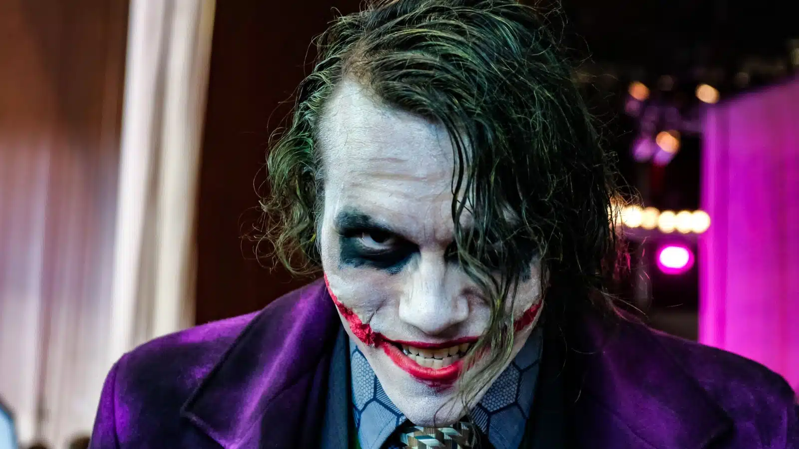 A person cosplaying as The Joker from The Dark Night. RUSSIA, ST.PETERSBURG - MAY 05, 2018: Epic Con 201