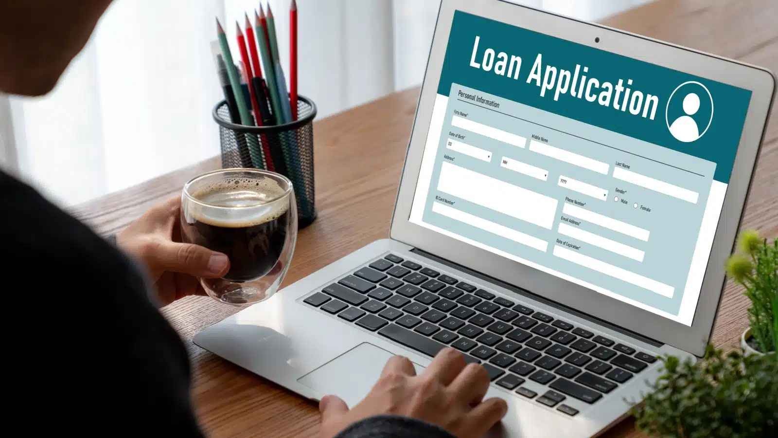 Person applying for a personal loan online.