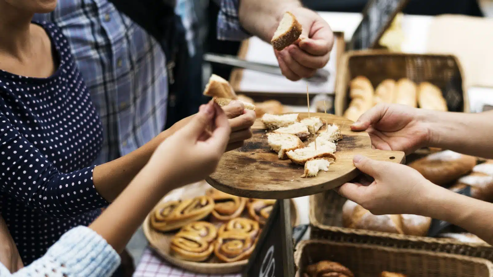 Guests take samples of homemade bread.