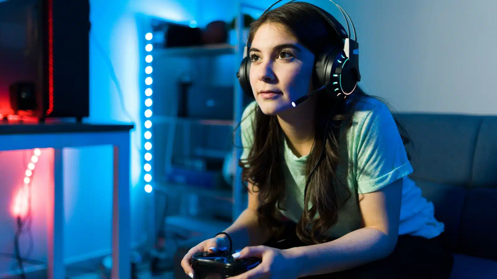 A woman engrossed in her video game.