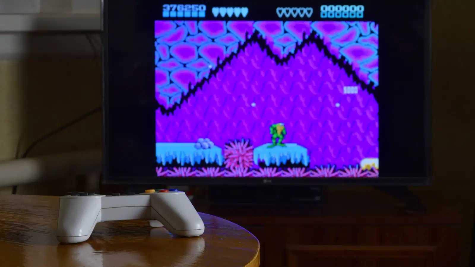 Vintage tv screen with one of the most challenging video games of all time, Battletoads, displayed.