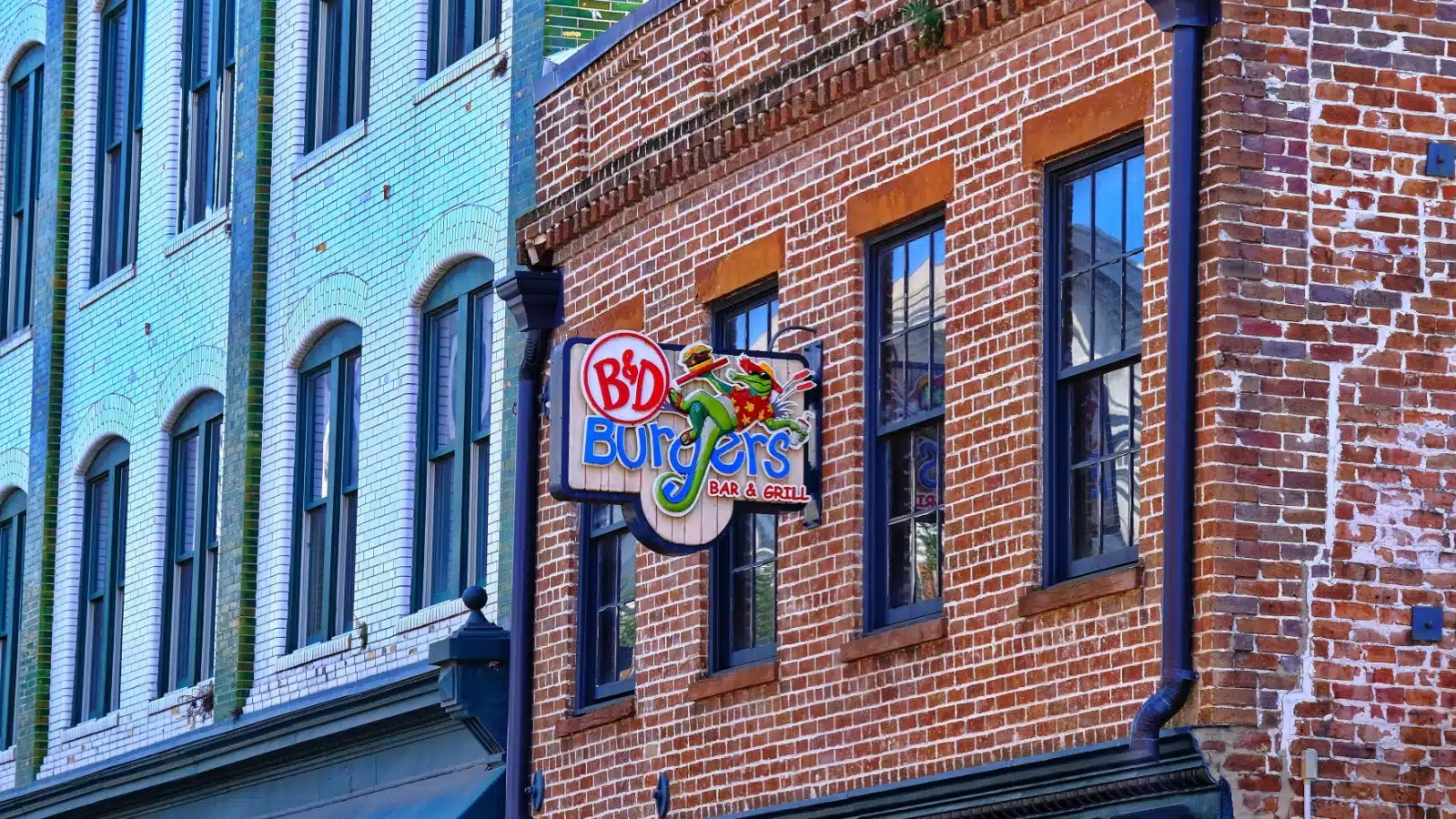 The storefront for B&D Burgers Bar & Grill, one of the best places to eat in Savannah.