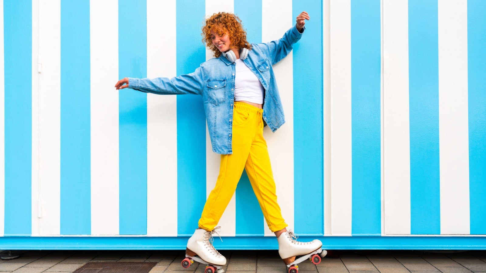 A woman having fun on roller skates to represent how to be true to yourself.