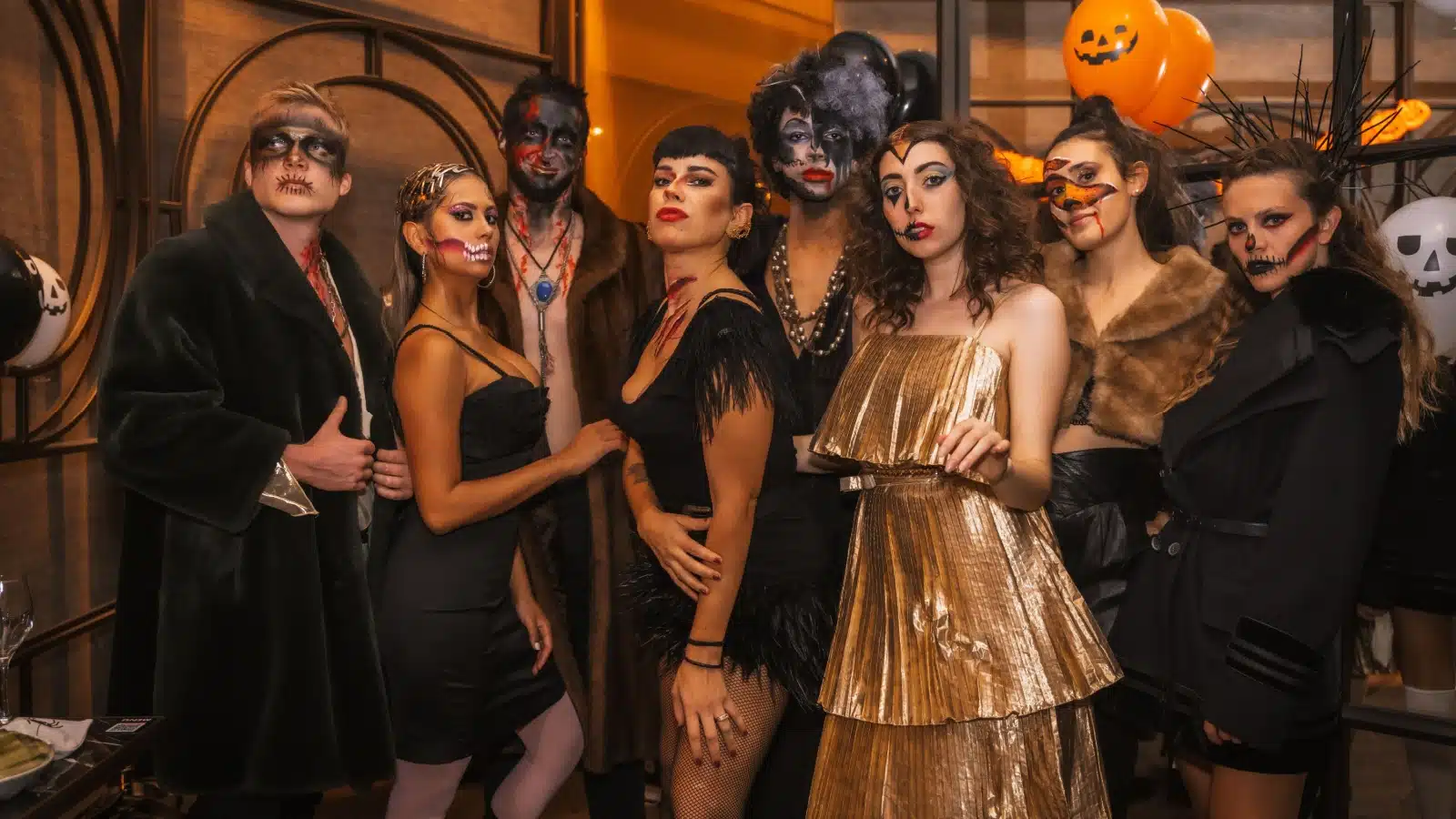 Guests dressed like witches and in other cosplay to enjoy a horror dance party or Witches Ball.