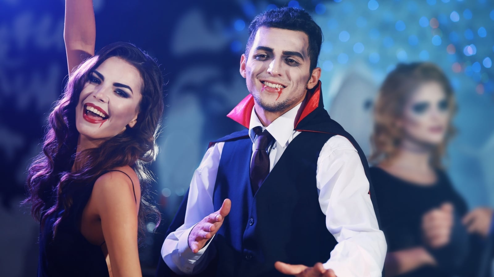 Cosplayers enjoying an evening after party at a horror convention.