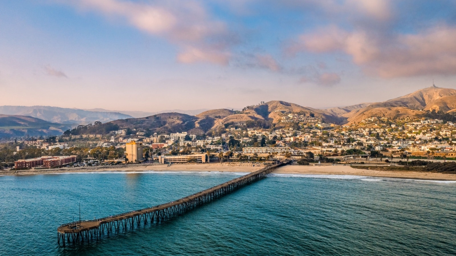 The pier stretching out from Ventura Beach, California.