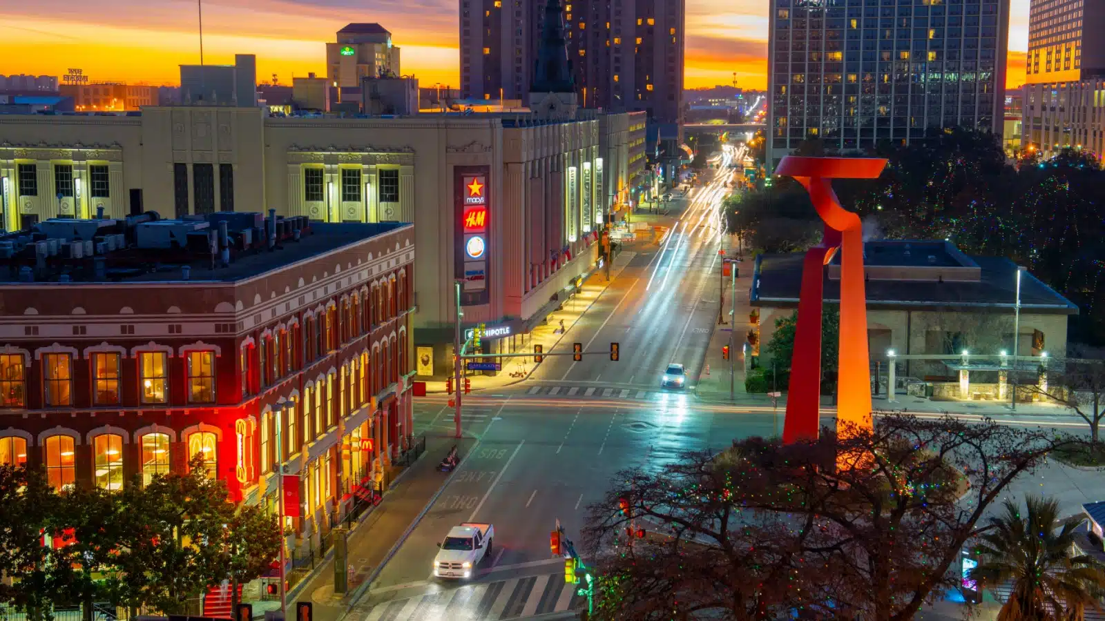 A view of downtown San Antonio featuring the sculpture "The Torch of Friendship" to represent underrated art cities.