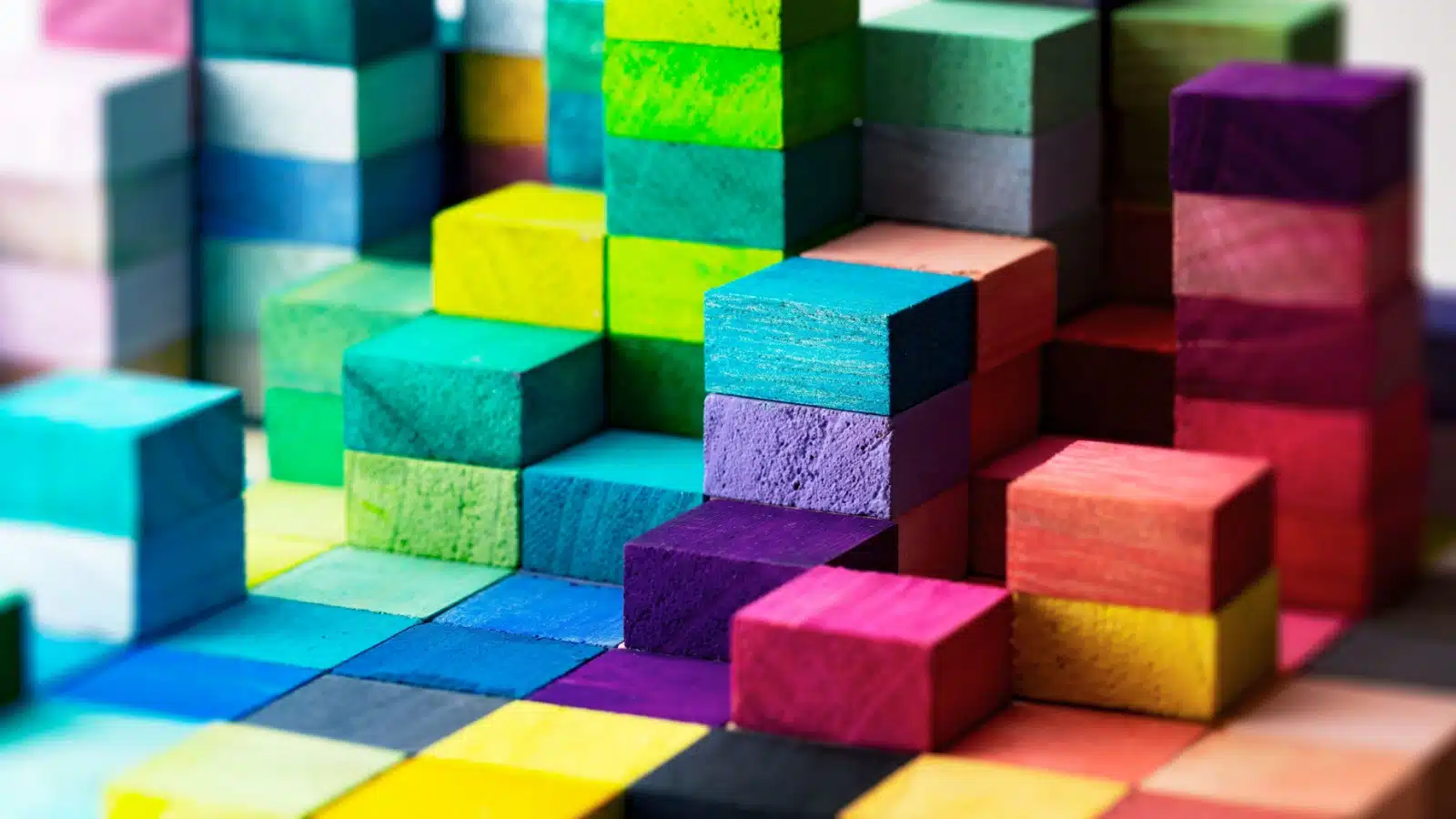 A colorful stack of small wooden blocks.