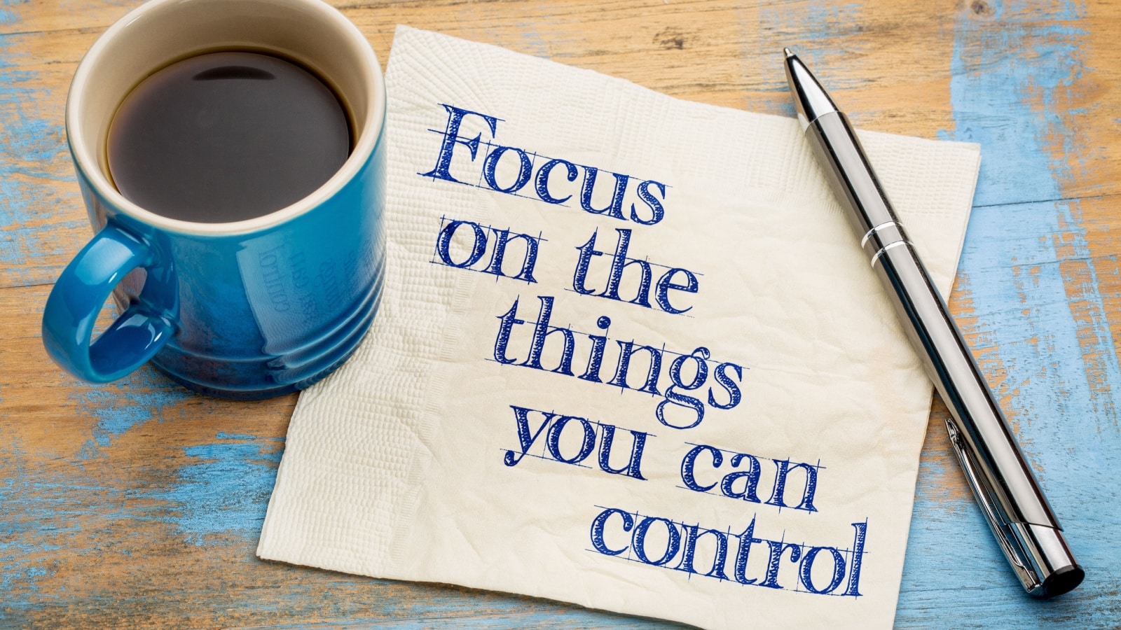 A napkin with "Focus on things you can control" written on it.