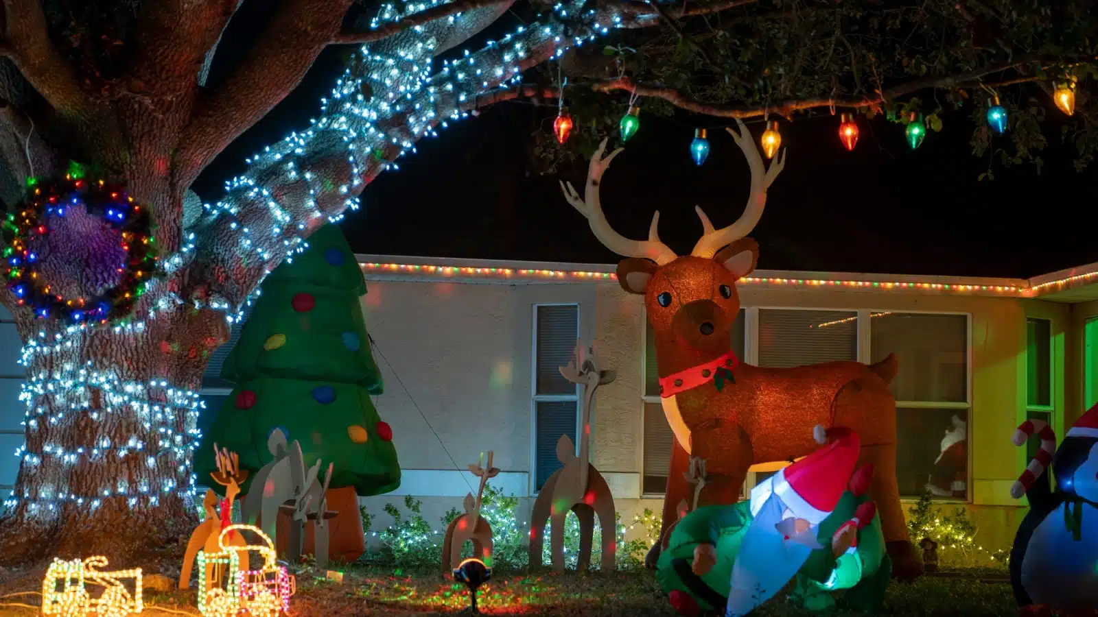 The exterior of a home decorated for Christmas.