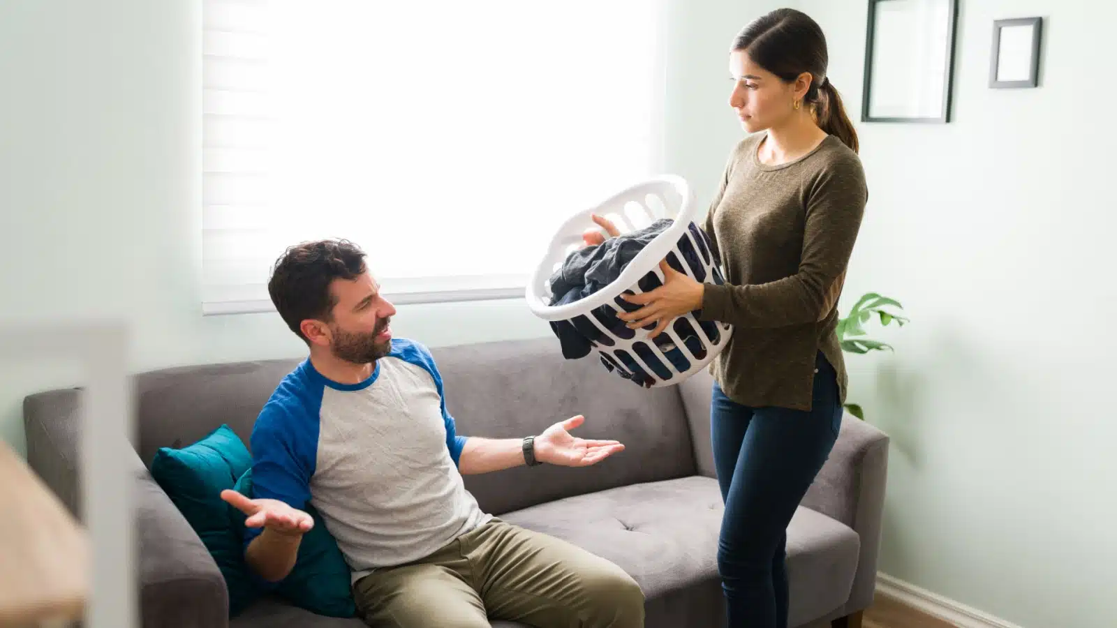 A man argues with his girlfriend because she dares to ask him for help with the chores.