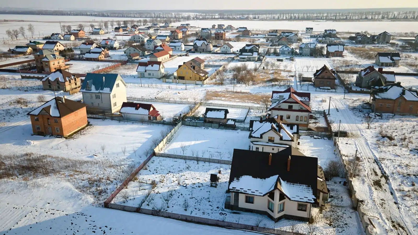 A small town in the winter with snow.