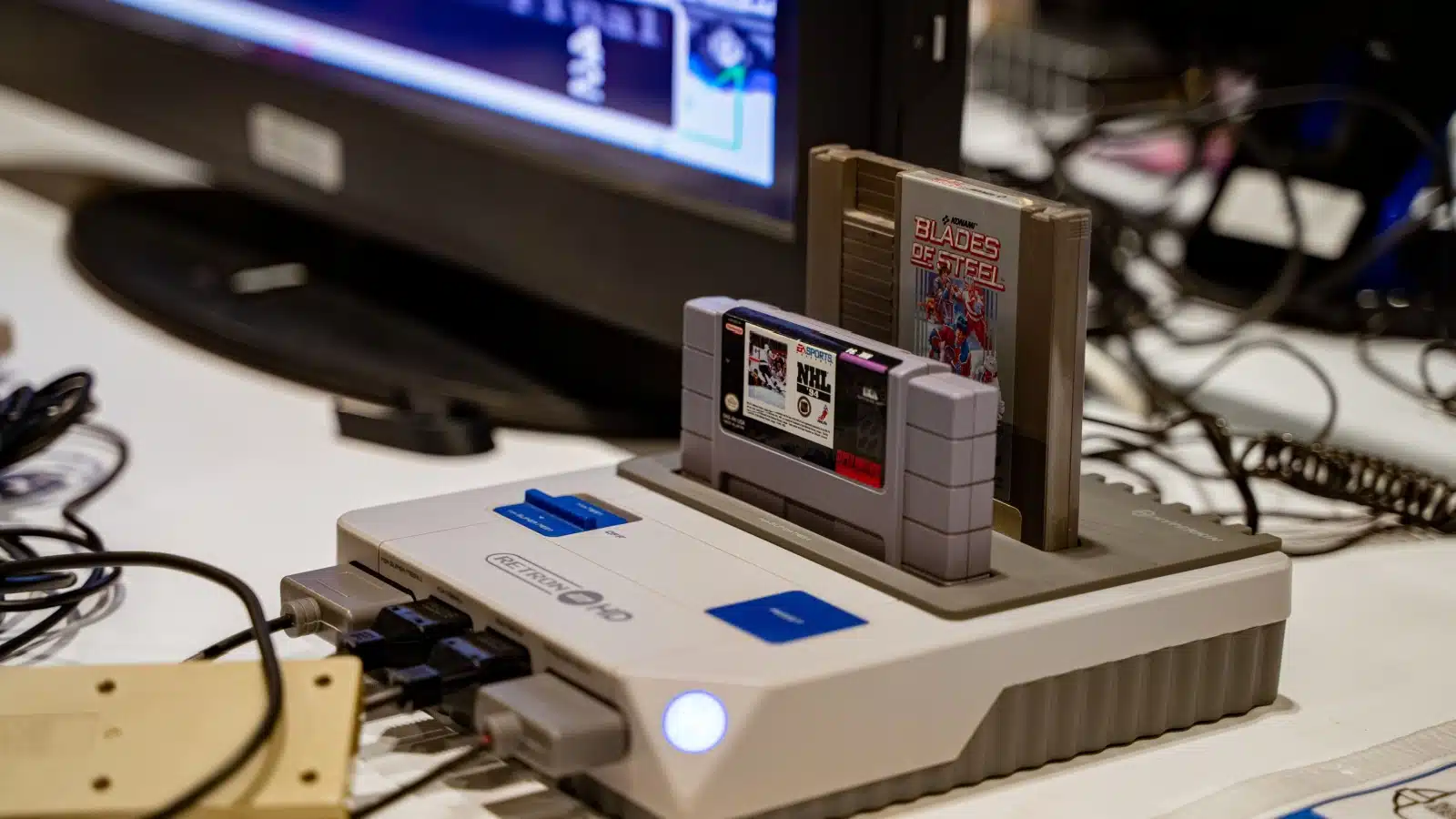 A retro-looking console that plays both Nintendo and Super Nintendo video games.