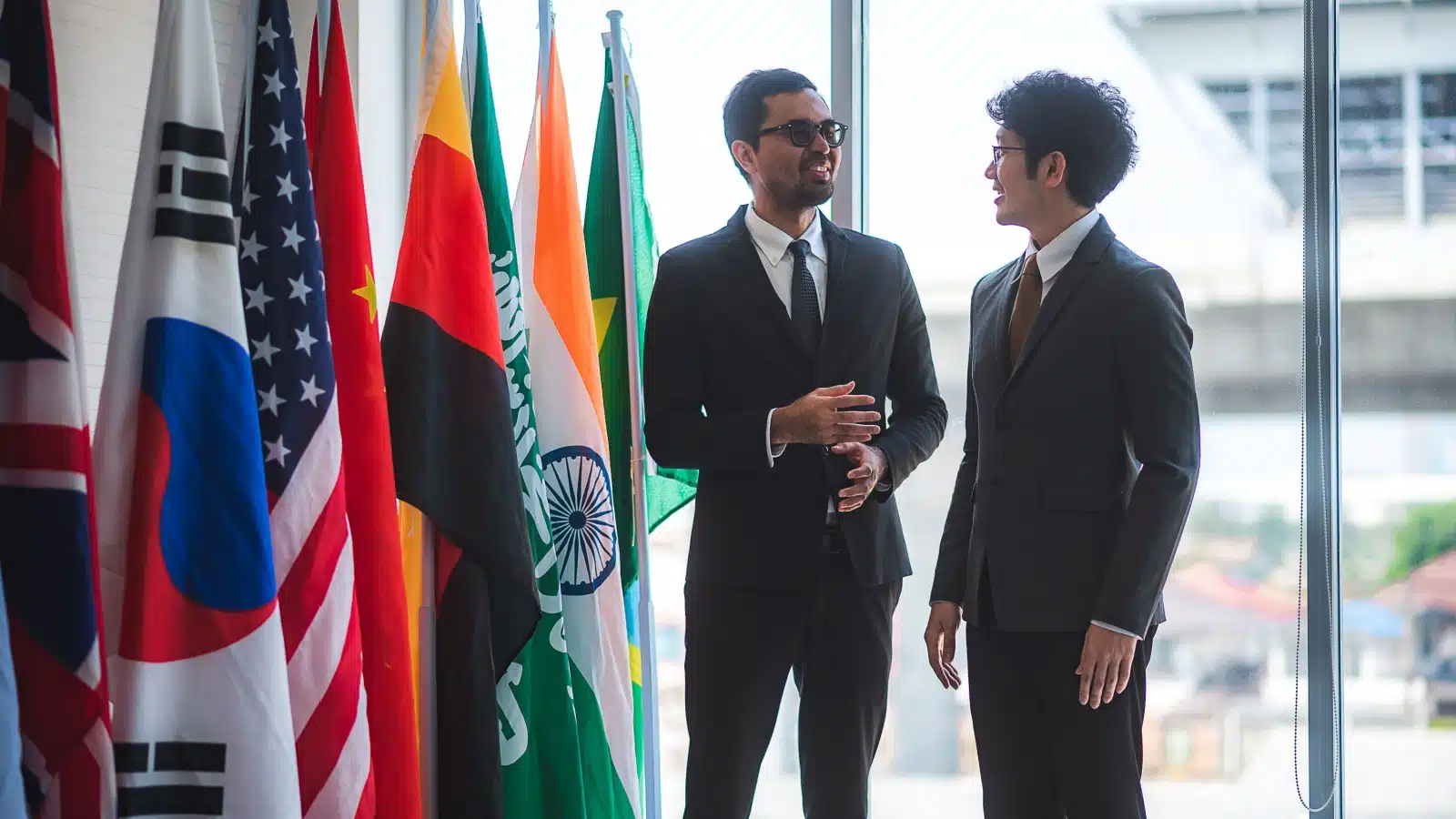 Foreign diplomats chatting.