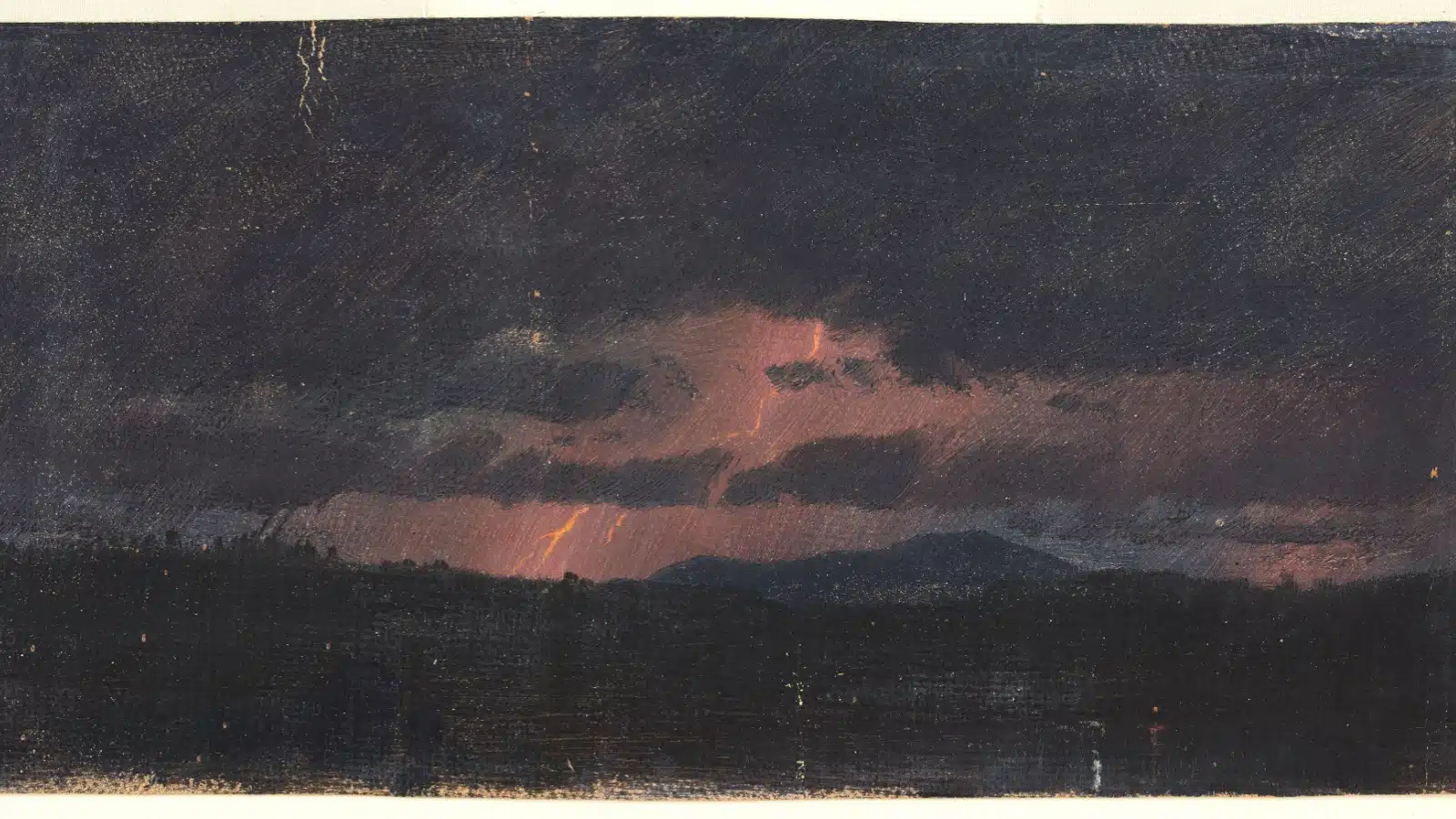 A painting of a dark night sets a dramatic tone.