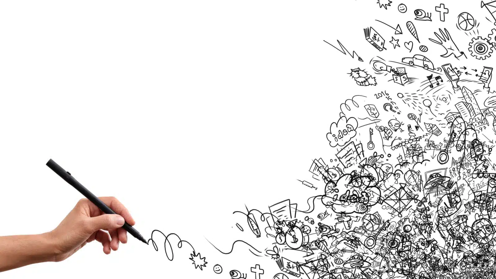 A hand making a bunch of doodles with a pen.