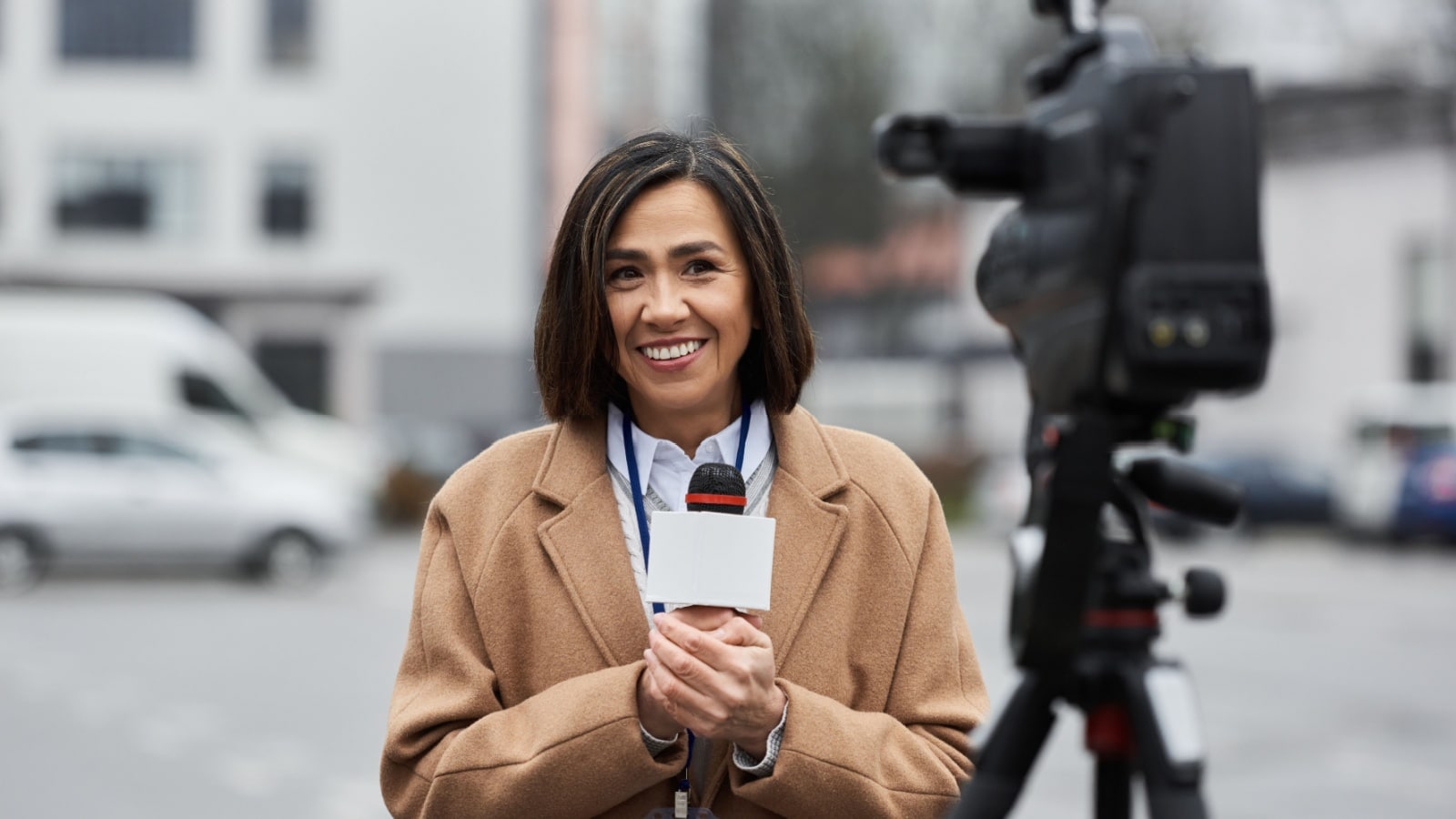 A journalist reports on location. 
