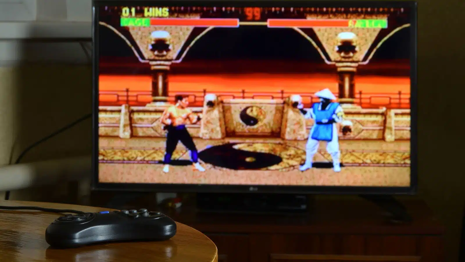 A vintage television with a scene from the Mortal Kombat video game series.