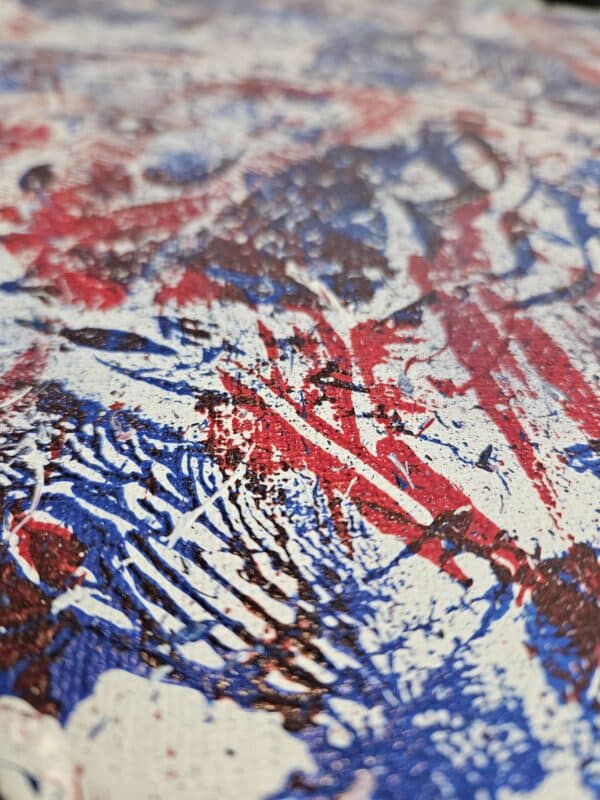 Close up of the Struggle of the Red, White and Blue showing color and texture.
