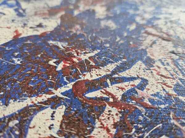 Angled close up of the Struggle of the Red, White and Blue showing texture.