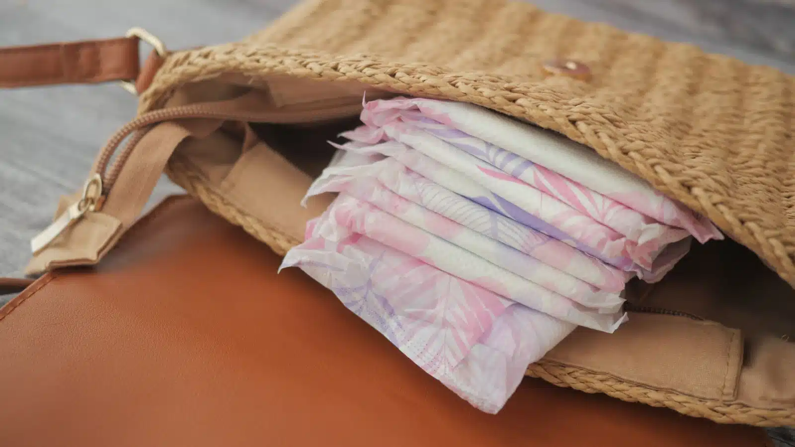 Feminine hygiene products in a purse.