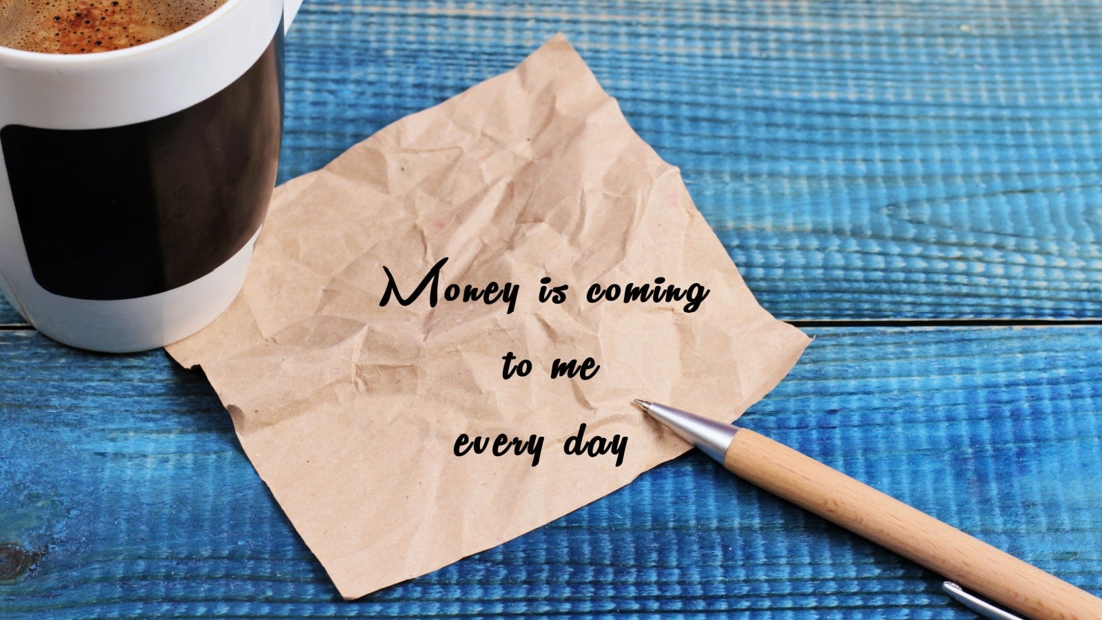 A note about attracting money written on a napkin to represent money affirmations.