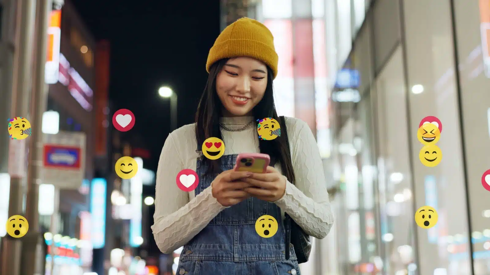 A woman supports content creators by engaging with them on social media via emoji.