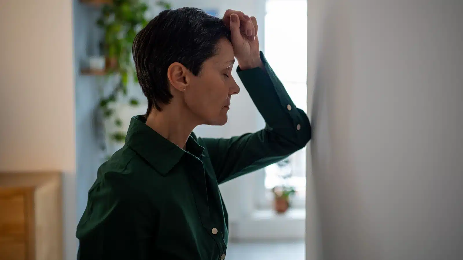 A woman is frustrated with herself because she believes she's not good enough.