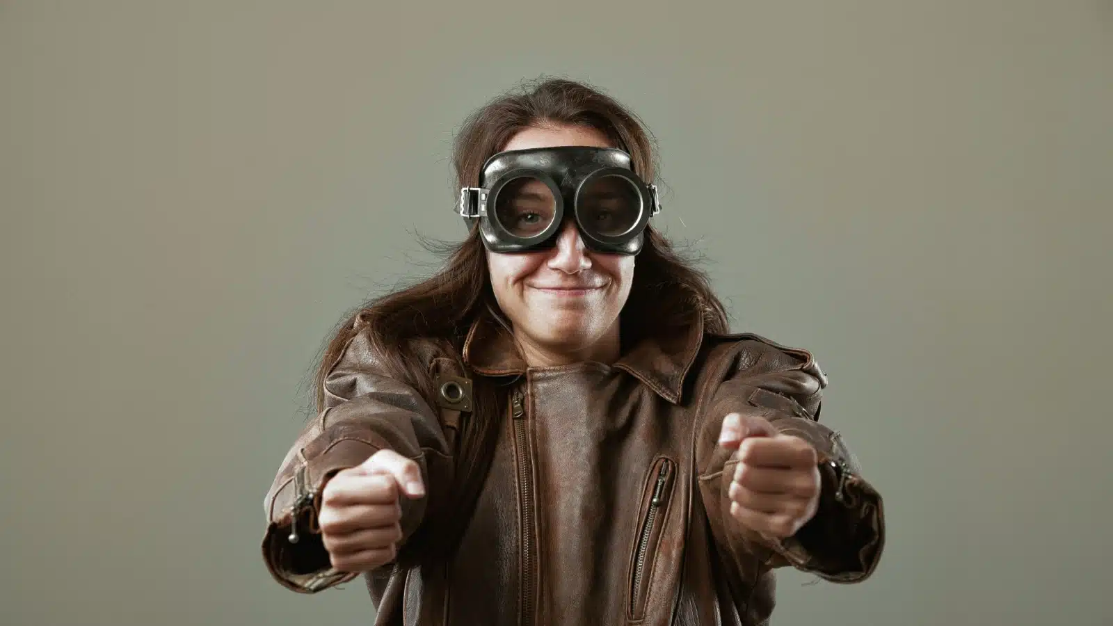 A woman role plays as a pilot.