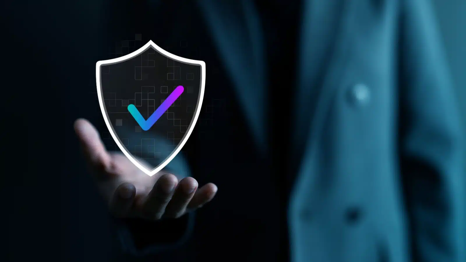 A businessperson holding a data security and trust icon.