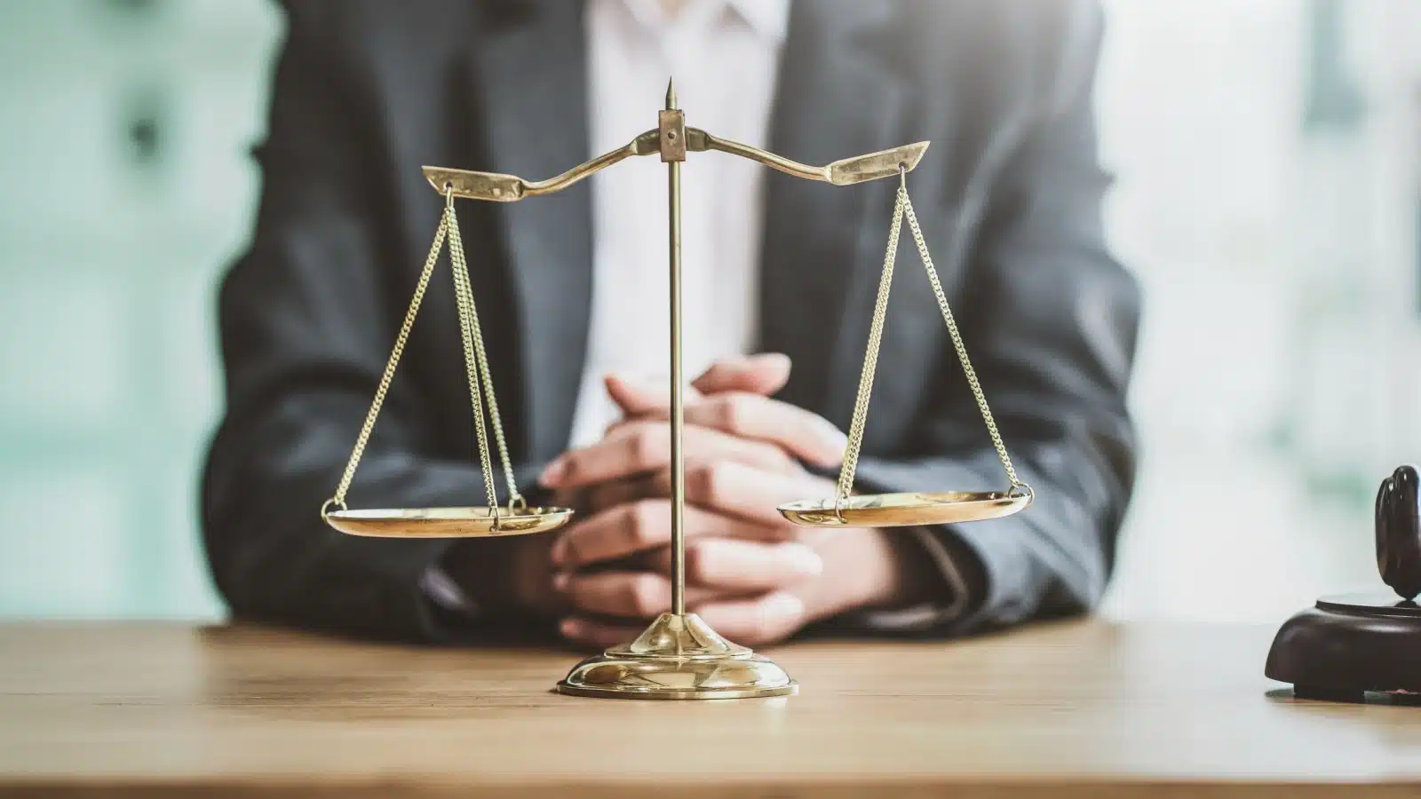 Balanced justice scales to represent integrity and fairness.