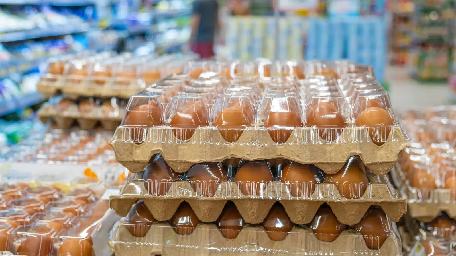 Bulk quantities of eggs at a grocery store.